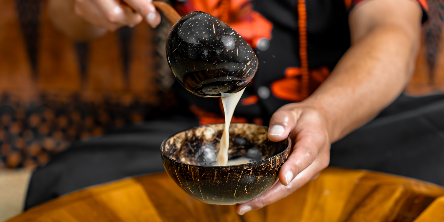 Amsterdam Island Kava serving Kava into a coconut shell.